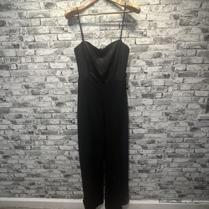 NWT bebe Black Strappy Jumpsuit Size M